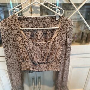 Altar’d State cheetah print silk set; crop top w/ ruffle skirt. Great condition